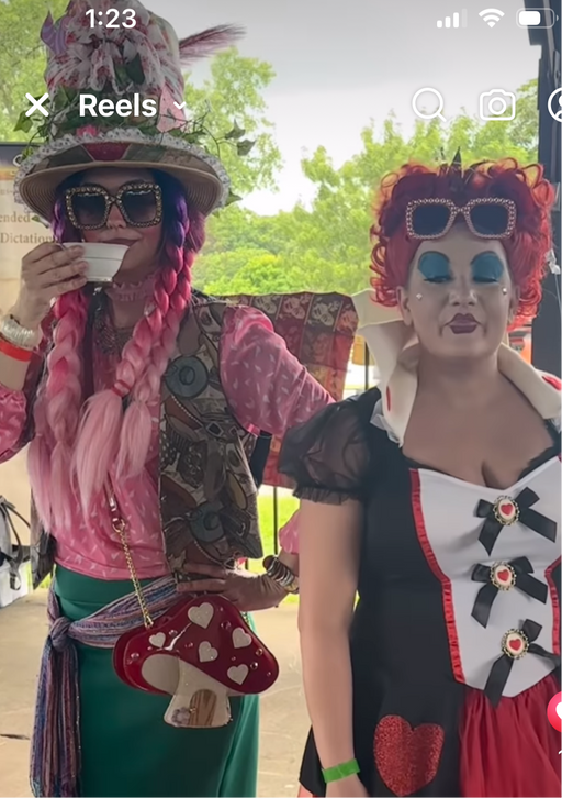 Colorful display of handmade Wonderland art decor at the Alice in Wonderland event, perfect for memorable photo opportunities.