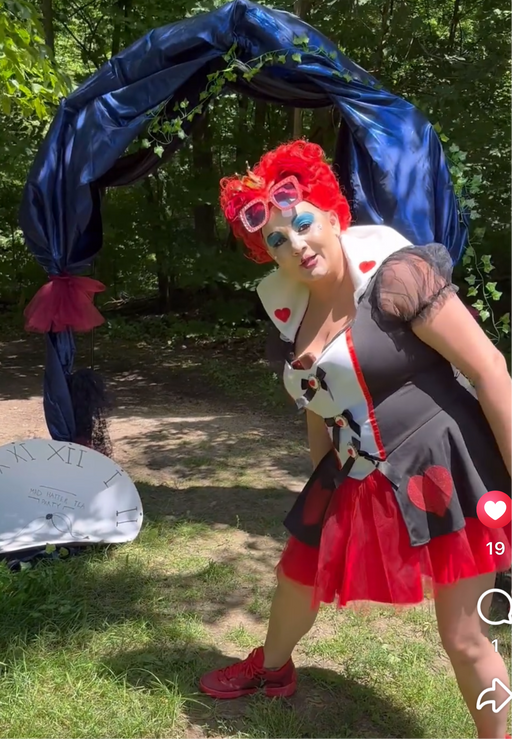 Fun moments at the Alice in Wonderland themed event featuring kids enjoying snacks and playing in a whimsical setting.