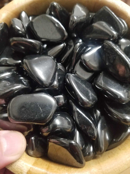 Tumbled Stones - Shungite tumbled, showcasing the unique black and silver energy stone, known for its healing properties and ability to purify water.