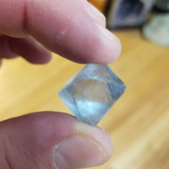 A collection of Fluorite Octahedrons, perfect for healing and energy balancing, available from High Ho Gems and Crystals.