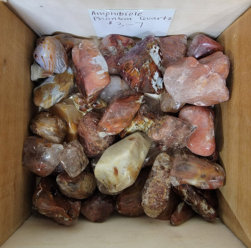 Amphibiole Tumbled Crystal showcasing its unique beauty, vibrant colors, and profound metaphysical properties. Perfect for transformation and spiritual clarity.