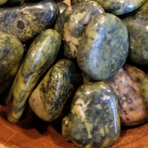 Tumbled Stones - Nephrite Jade Tumbled pieces showcasing beautiful green colors ideal for lucid dreaming and nurturing energy.