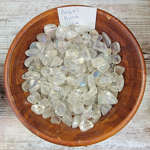 Close-up view of Angel Aura chips showcasing their iridescent colors, perfect for crystal healing and decorative purposes.