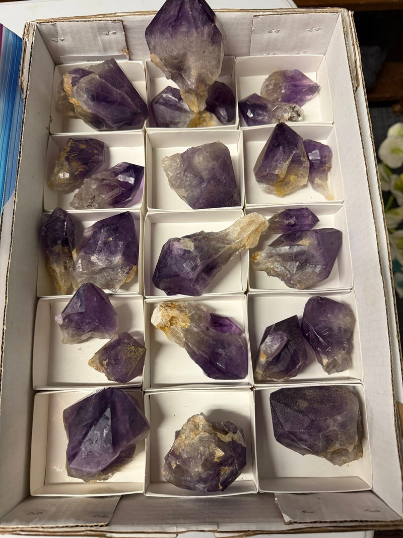 Hand-selected healing crystals including amethyst, quartz, and polished stones at High Ho Gems