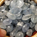 Beautiful Celestite tumbled stone in stunning blue hues, showcasing its natural crystal formation, perfect for collectors and crystal enthusiasts.