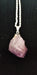 Jewelry featuring an Amethyst nugget pendant, elegantly wrapped in silver. Ideal for enhancing intuition and promoting peace of mind.