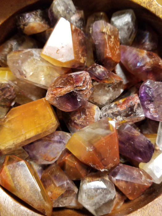 Tumbled stones - Cacoxenite Amethyst