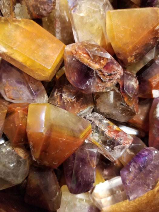 Tumbled stones - Cacoxenite Amethyst