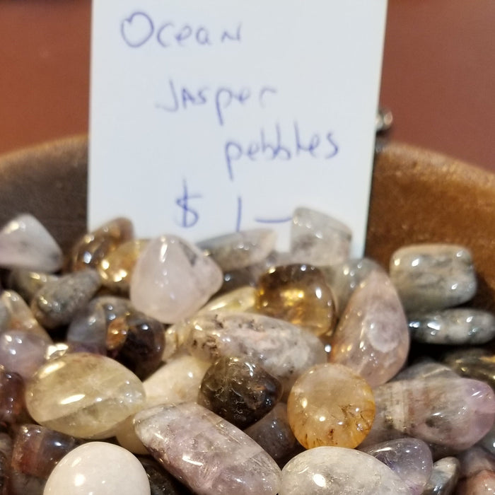 Beautiful Tumbled stones - Ocean Jasper Pebbles in various colors such as green, yellow, brown, and pink, ideal for inducing tranquility and eliminating negative energy.