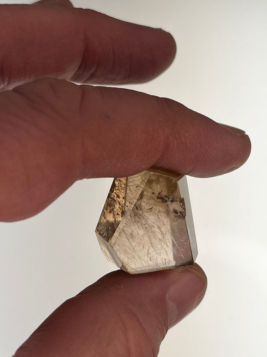 Very clear smoky Quartz DT point with inclusion