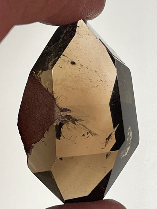 Very clear smoky Quartz DT point with inclusion